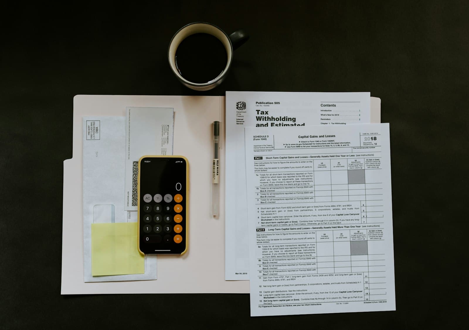 Invoices and calculator for Bloomington business accounting